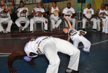 Crianças aprendem a cultura ancestral na capoeira